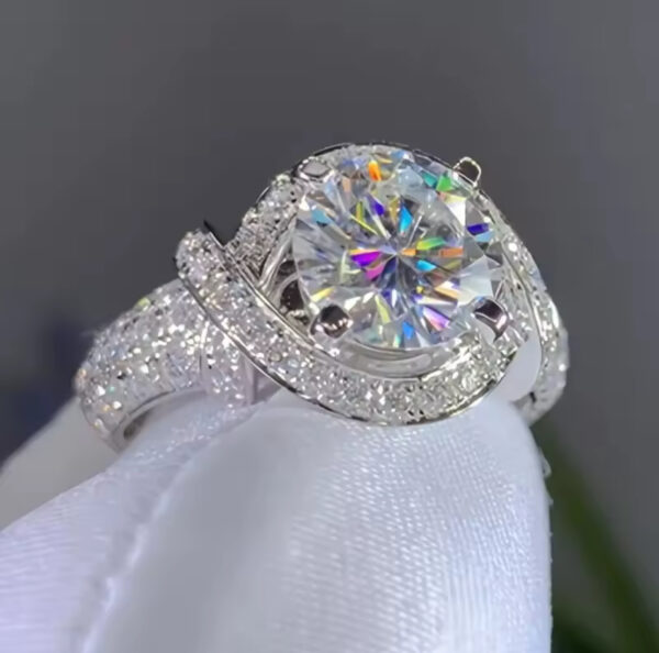 Diamond crested engagement ring