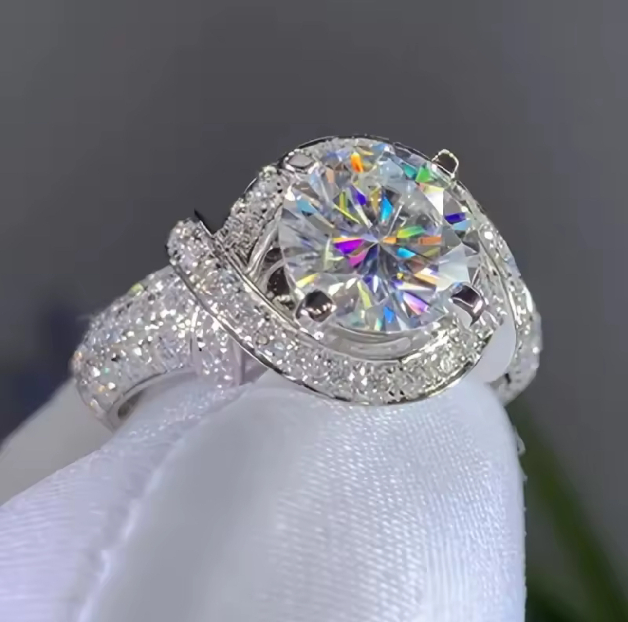 Diamond crested engagement ring